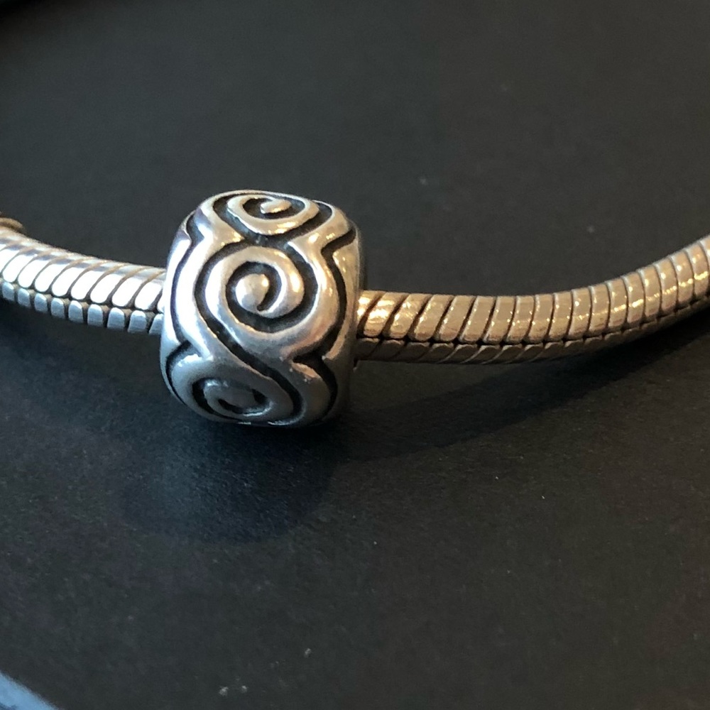 Retired PANDORA large swirl charm